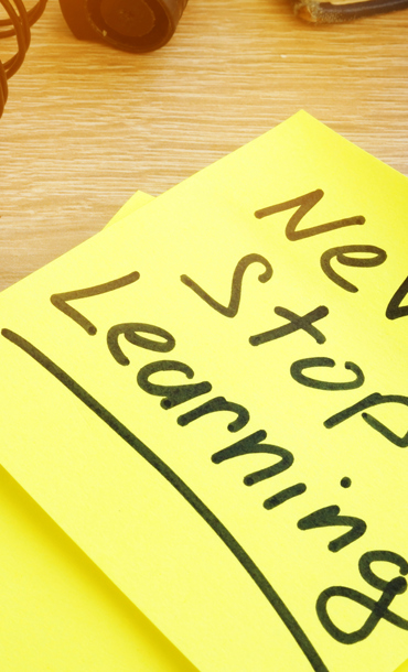 Post-it note saying Never stop learning