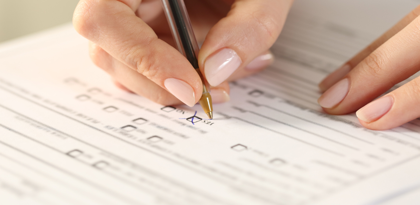 nojs Hand with pen completing a form.