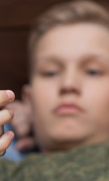 Young male with mobile phone