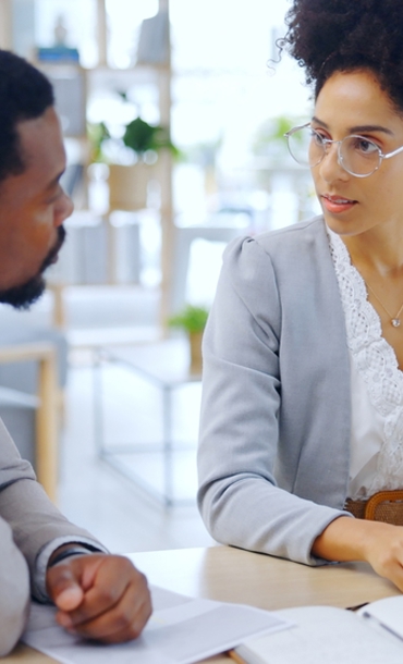 A manager meeting with an employee