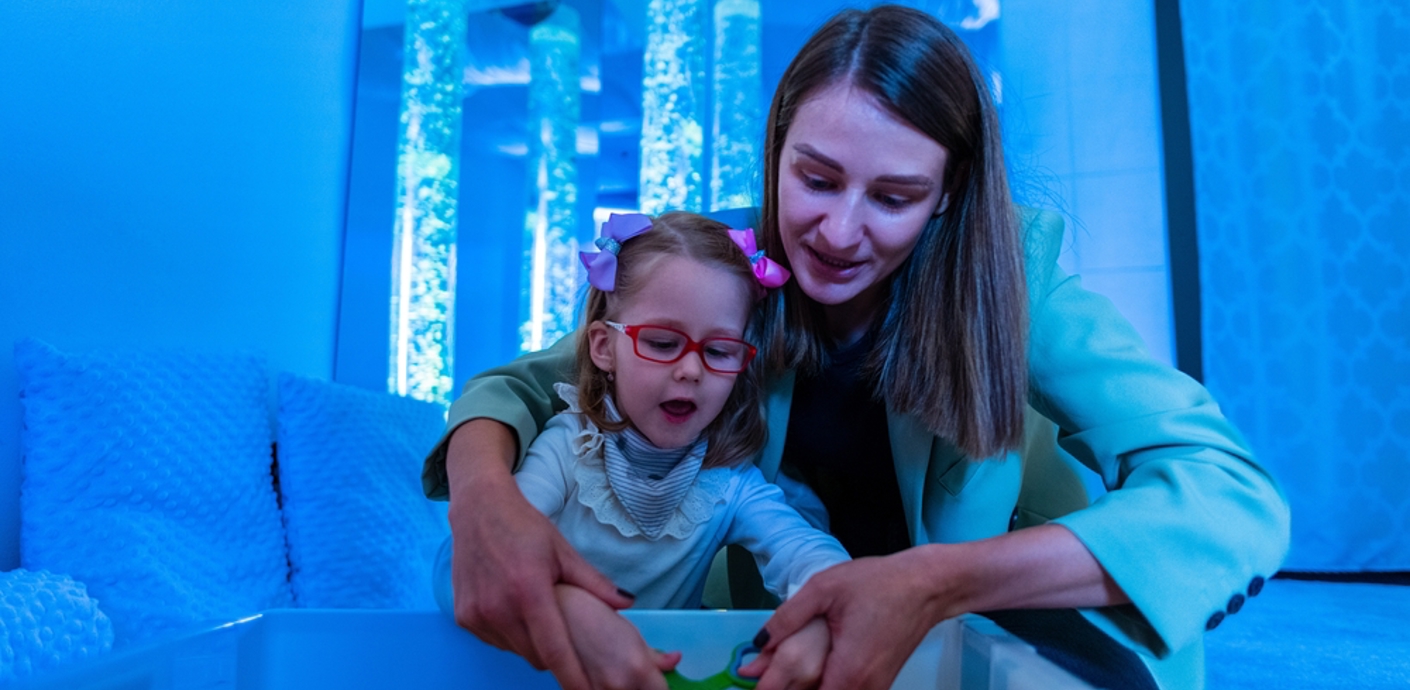 Adult and child playing a game